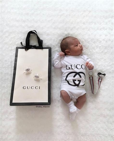 designer babies wearing Gucci